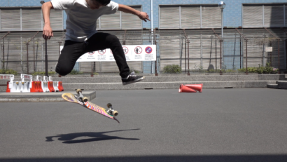 image of a varial kickflip